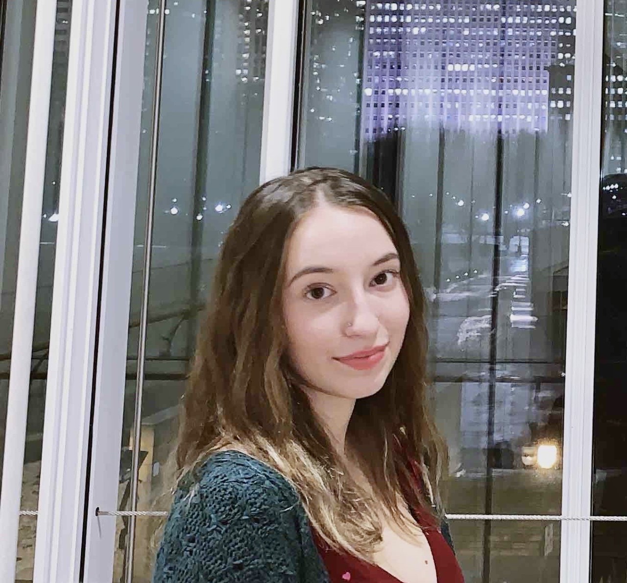 Gabrielle Stec posing in front of a window